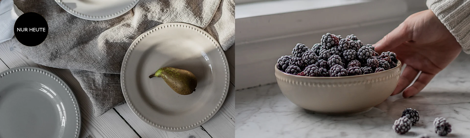 Creme- und graue Teller mit Perlenrand und einer Birne, sowie eine Schüssel mit gefrorenen Brombeeren, gehalten von einer Hand. Nur heute.